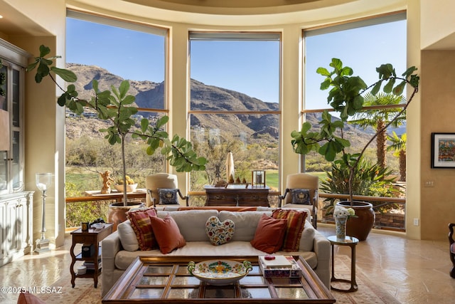 living area featuring a mountain view