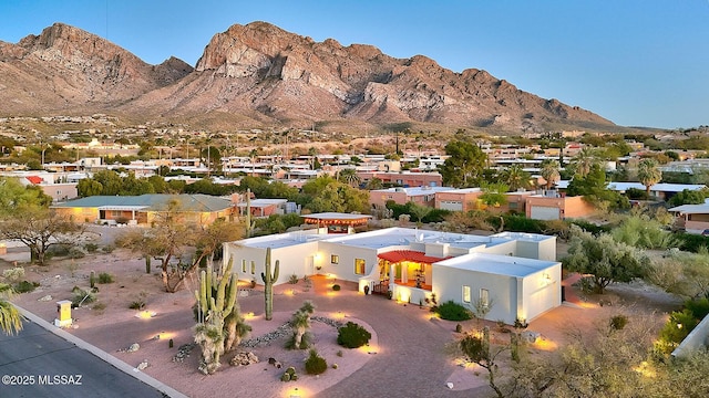 drone / aerial view with a residential view and a mountain view