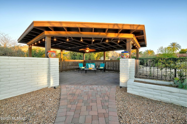 view of patio / terrace featuring fence
