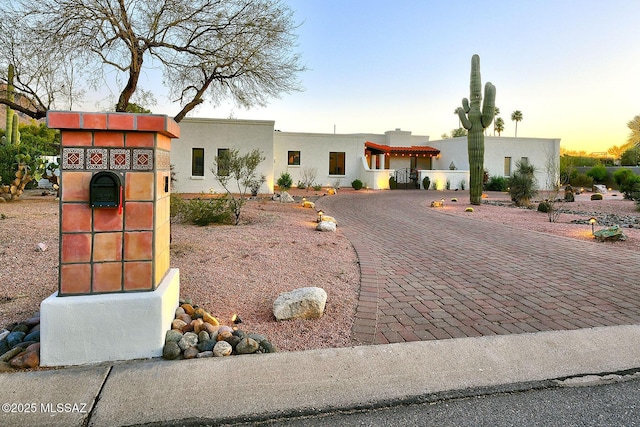 view of front of home with stucco siding