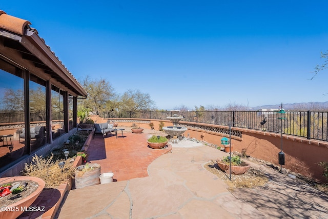 view of patio with a fenced backyard