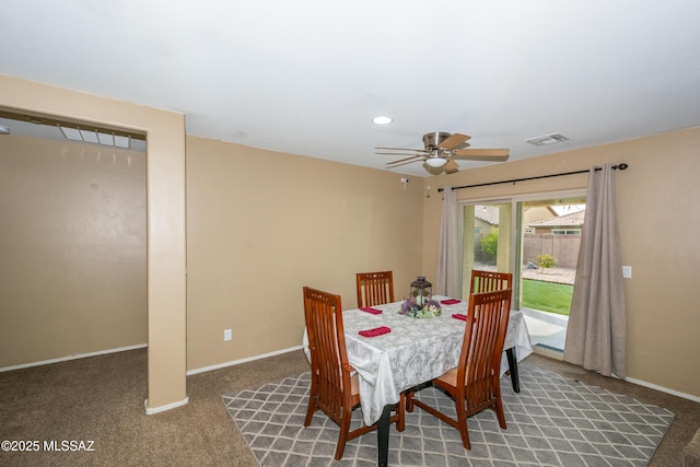 carpeted dining room featuring baseboards, visible vents, recessed lighting, and a ceiling fan