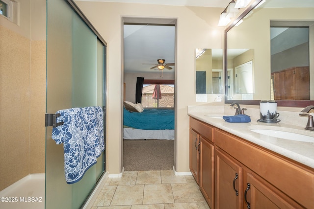 ensuite bathroom featuring ensuite bath, a sink, a shower with shower door, and a ceiling fan