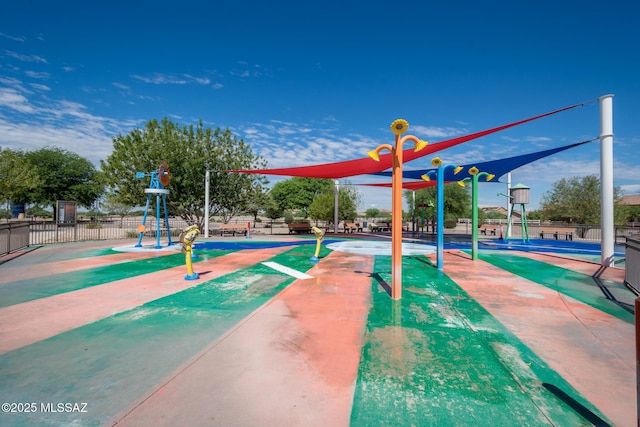 view of community featuring fence