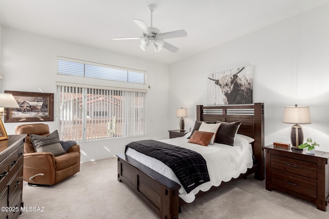 carpeted bedroom featuring a ceiling fan