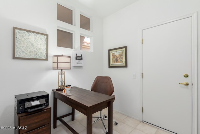office area with light tile patterned flooring