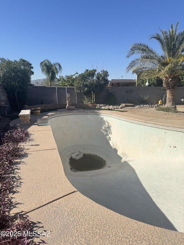 view of pool featuring a fenced backyard and a fenced in pool
