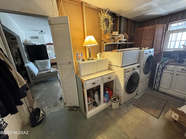 laundry room with washer and clothes dryer