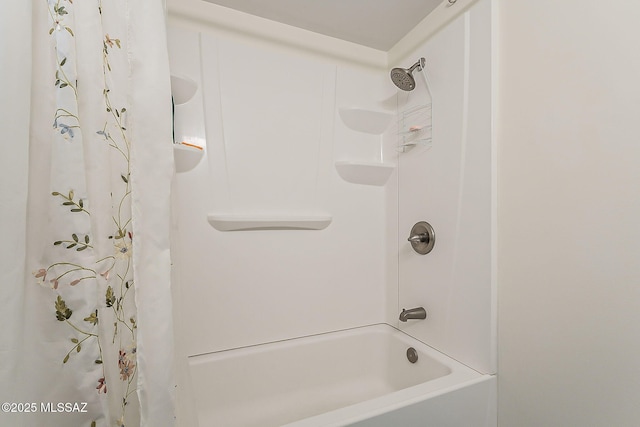 bathroom featuring shower / bath combination with curtain