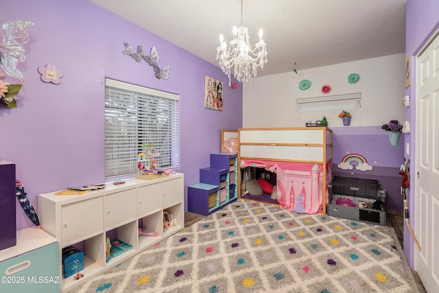 bedroom featuring a notable chandelier