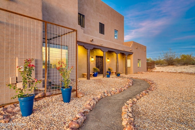 exterior space featuring stucco siding