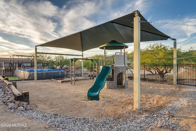 community playground featuring fence