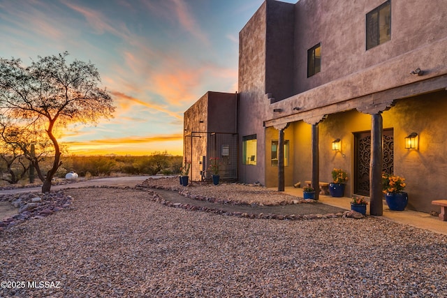 view of home's exterior with stucco siding