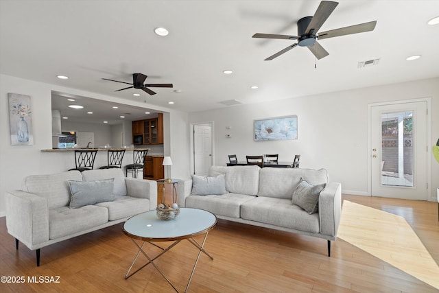 2350 E Juanita St, Tucson, AZ 85719 - living area with a ceiling fan, light wood finished floors, recessed lighting, and baseboards