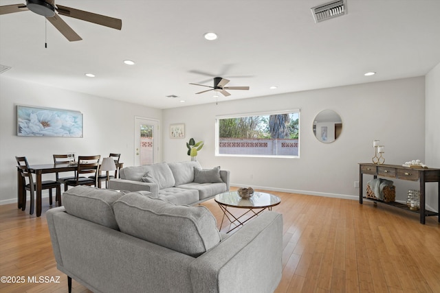 2350 E Juanita St, Tucson, AZ 85719 - living room featuring ceiling fan, recessed lighting, baseboards, and light wood-type flooring