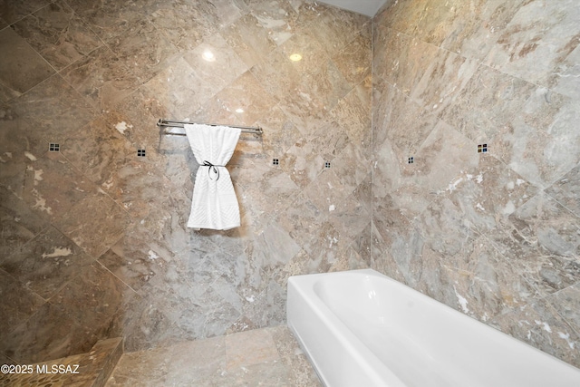 2350 E Juanita St, Tucson, AZ 85719 - full bathroom with a tub to relax in, a shower, and tile walls