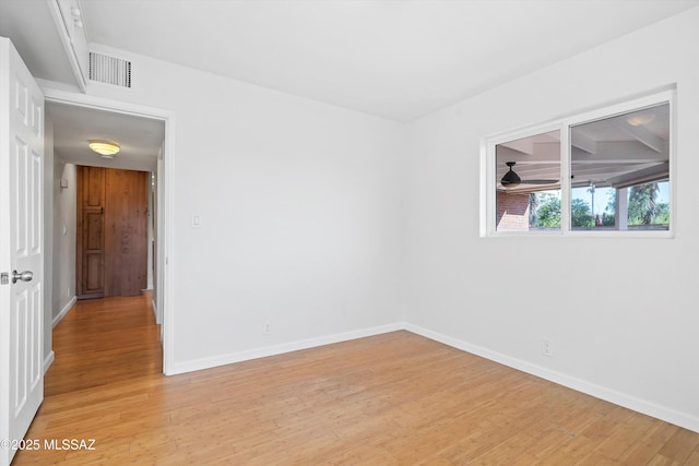 2350 E Juanita St, Tucson, AZ 85719 - spare room featuring light wood-style floors and baseboards