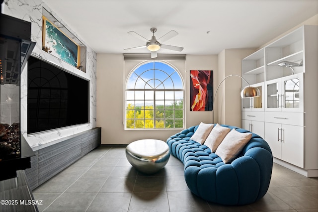 1500 E Pusch Wilderness Dr Unit 2202, Tucson, AZ 85737 - sitting room featuring tile patterned floors and a ceiling fan