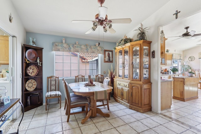 dining space featuring ceiling fan