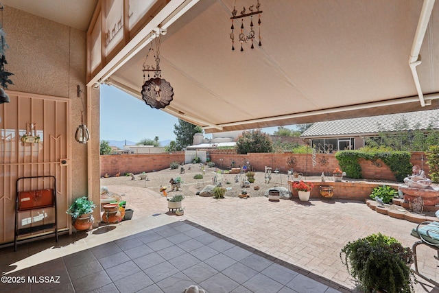 view of patio with a fenced backyard