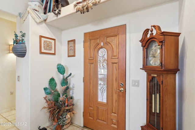 foyer with light tile patterned flooring