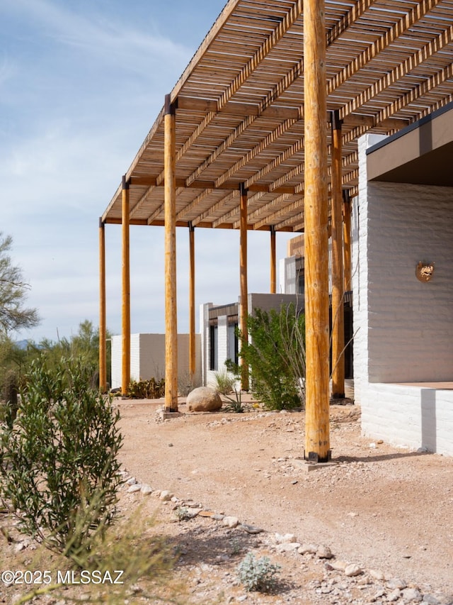 exterior space with a pergola