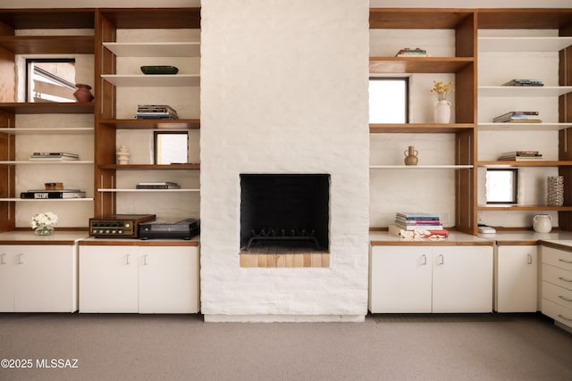 unfurnished living room with a fireplace