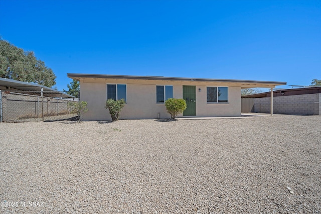 7575 E Apple Tree Dr, Tucson, AZ 85730 - back of house with stucco siding