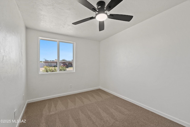 7575 E Apple Tree Dr, Tucson, AZ 85730 - carpeted spare room featuring baseboards and a ceiling fan