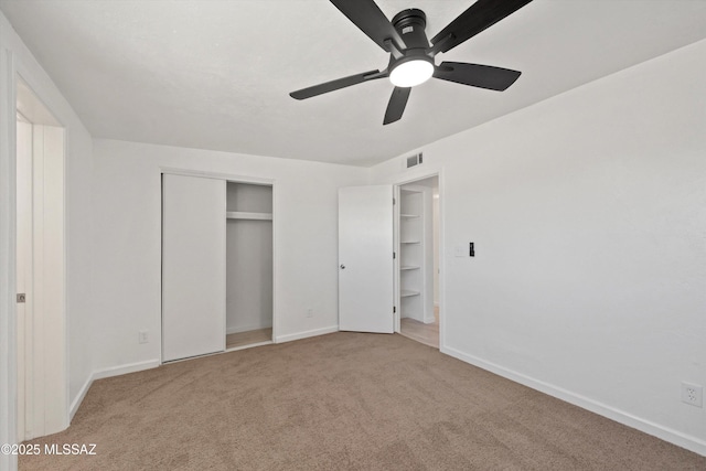 7575 E Apple Tree Dr, Tucson, AZ 85730 - unfurnished bedroom featuring carpet floors, baseboards, a closet, and a ceiling fan