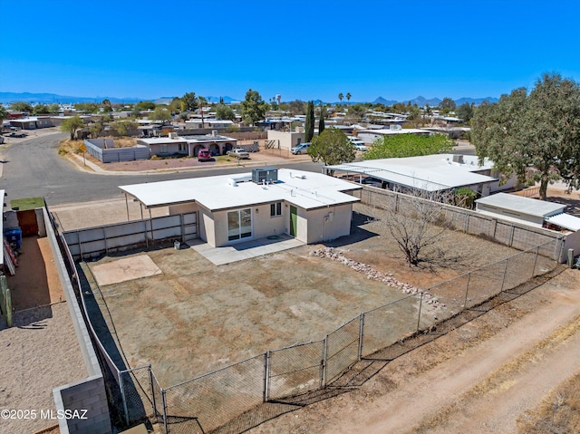 7575 E Apple Tree Dr, Tucson, AZ 85730 - aerial view of residential area featuring a mountain backdrop