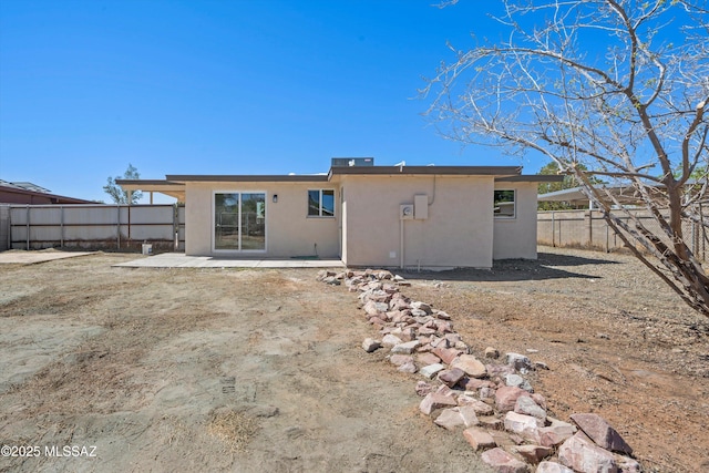 7575 E Apple Tree Dr, Tucson, AZ 85730 - rear view of property featuring stucco siding, a fenced backyard, and a patio area