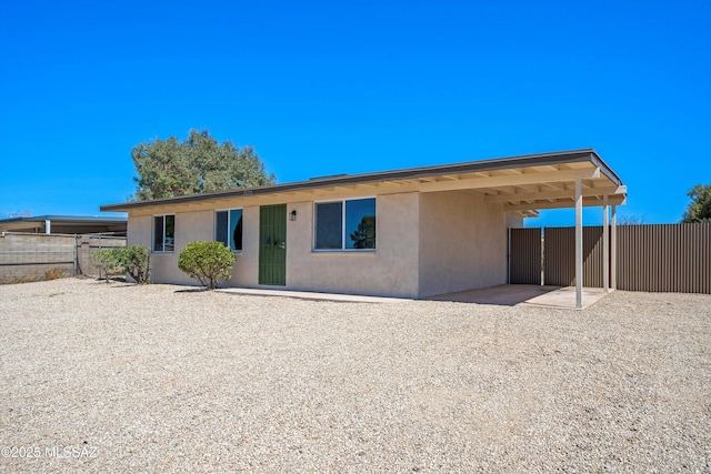 7575 E Apple Tree Dr, Tucson, AZ 85730 - back of house with stucco siding
