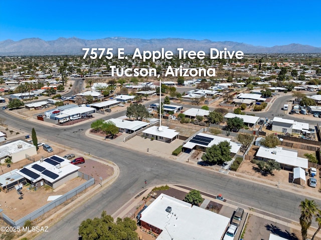 7575 E Apple Tree Dr, Tucson, AZ 85730 - aerial view of residential area with a mountainous background