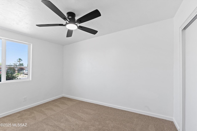 7575 E Apple Tree Dr, Tucson, AZ 85730 - unfurnished room featuring light carpet, baseboards, and ceiling fan