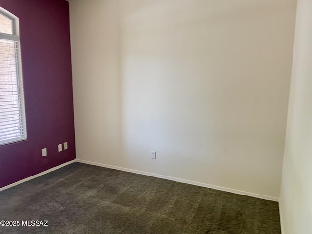 13978 N Big Wash Overlook Pl, Tucson, AZ 85739 - spare room featuring dark carpet and baseboards