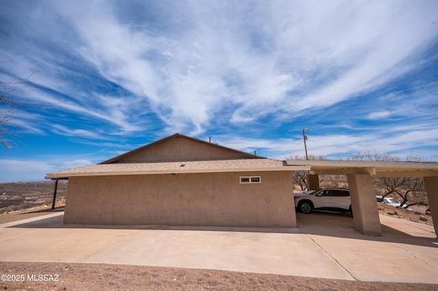 view of home's exterior with stucco siding