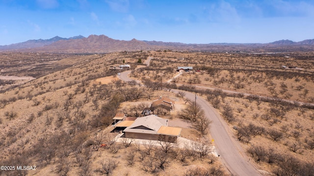 birds eye view of property featuring a mountain view