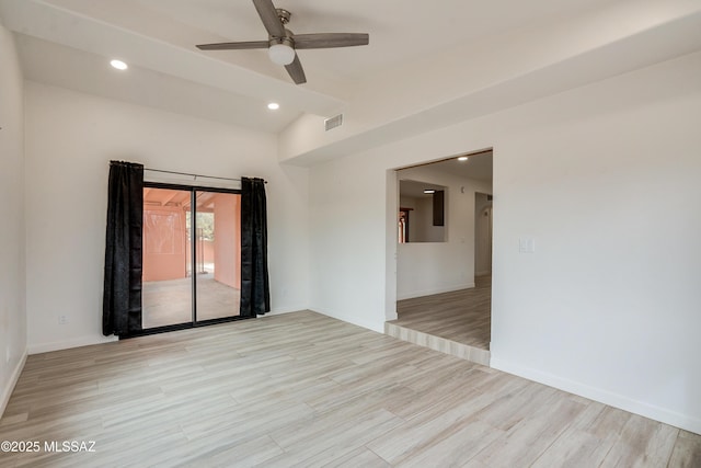 3053 W Lobo Rd, Tucson, AZ 85742 - empty room featuring visible vents, light wood finished floors, vaulted ceiling with beams, recessed lighting, and ceiling fan