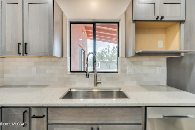 3053 W Lobo Rd, Tucson, AZ 85742 - kitchen featuring backsplash, dishwasher, gray cabinets, and a sink