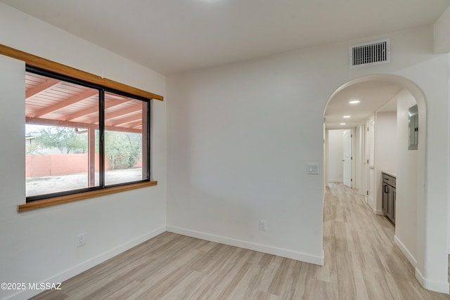 3053 W Lobo Rd, Tucson, AZ 85742 - empty room featuring visible vents, baseboards, and light wood finished floors