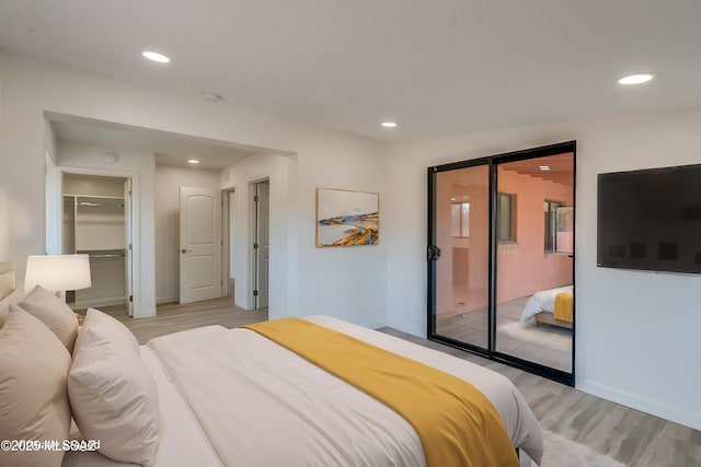 3053 W Lobo Rd, Tucson, AZ 85742 - bedroom featuring recessed lighting, light wood-style floors, a closet, and baseboards