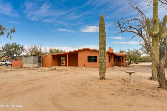 3053 W Lobo Rd, Tucson, AZ 85742 - exterior space with a chimney