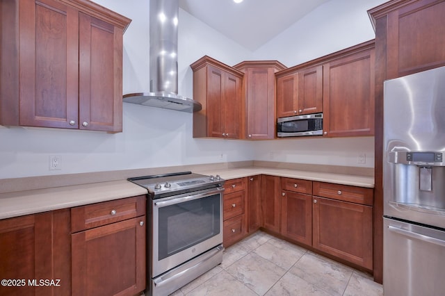 kitchen featuring brown cabinets, appliances with stainless steel finishes, light countertops, and wall chimney range hood