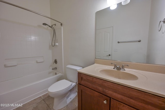 full bath with tile patterned flooring, tub / shower combination, toilet, and vanity