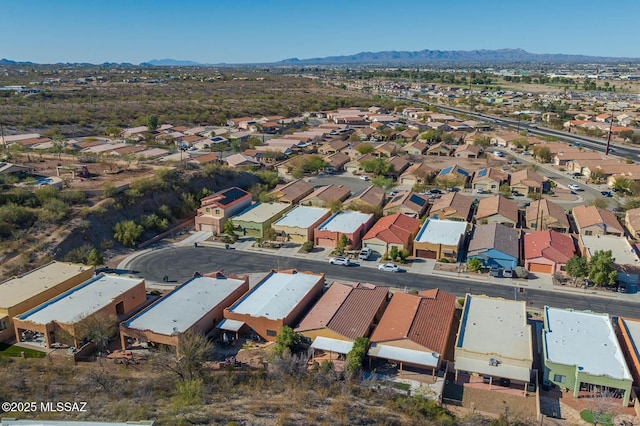 aerial view with a mountain view and a residential view