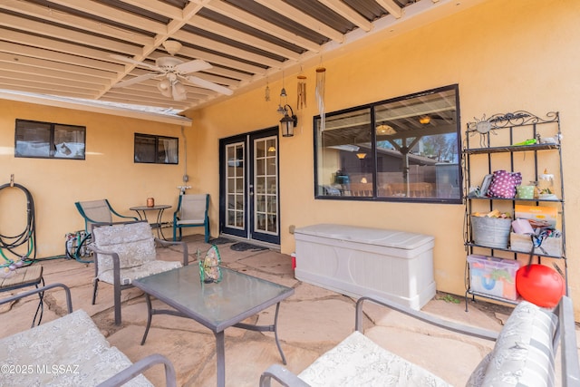 view of patio / terrace featuring french doors and a ceiling fan