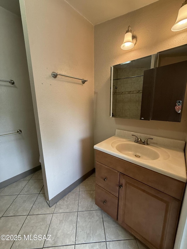 1419 E Linden St, Tucson, AZ 85719 - full bath with vanity, tile patterned floors, and a textured wall