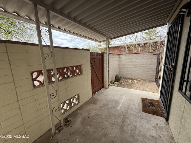 view of patio / terrace featuring fence