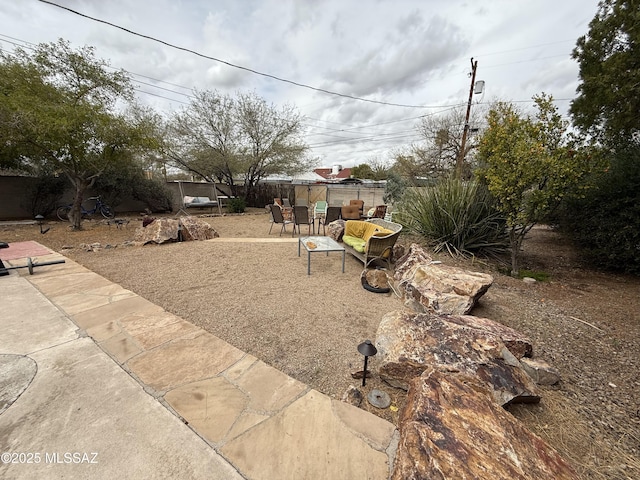 view of yard with a patio area and fence